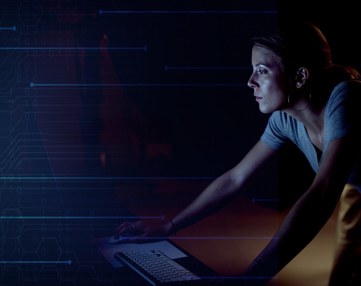 Creative woman working on a computer in a studio