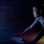 Creative woman working on a computer in a studio